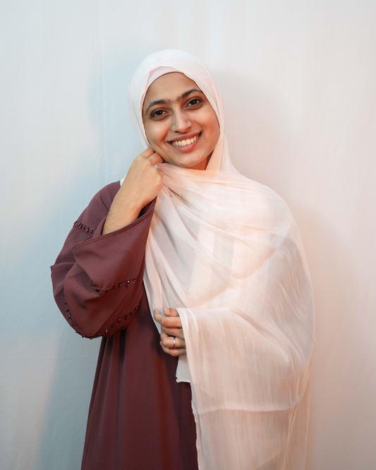 Dusty pink shimmer hijab lightweight premium fabric soft elegant drape modest fashion scarf.