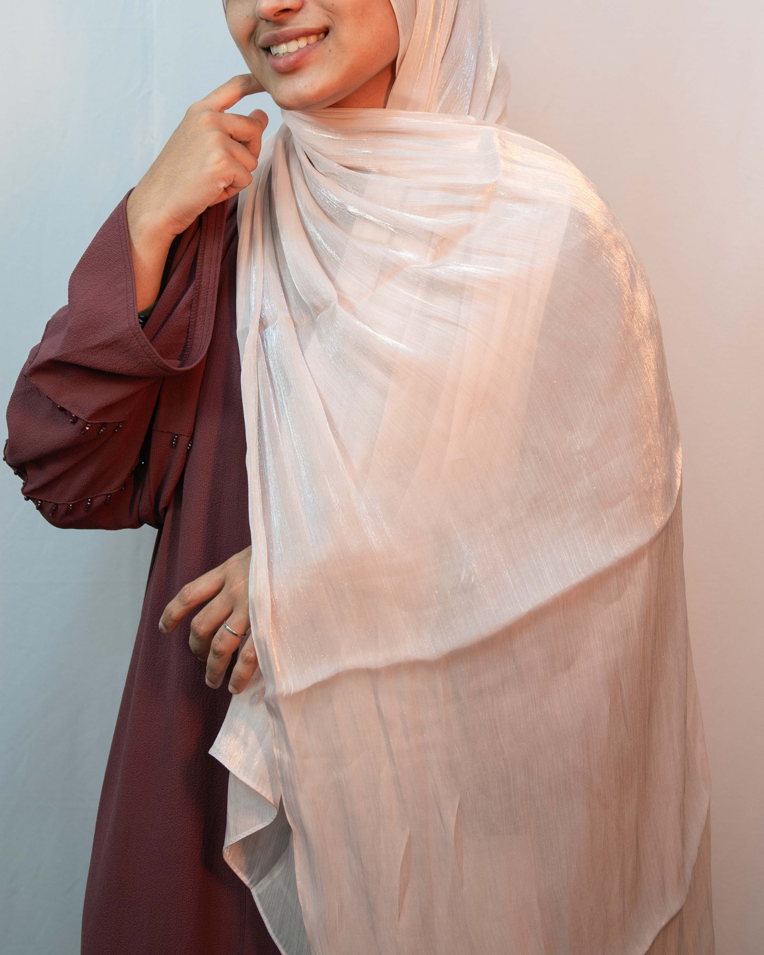 Premium dusty pink shimmer hijab soft breathable fabric elegant modest wear scarf.