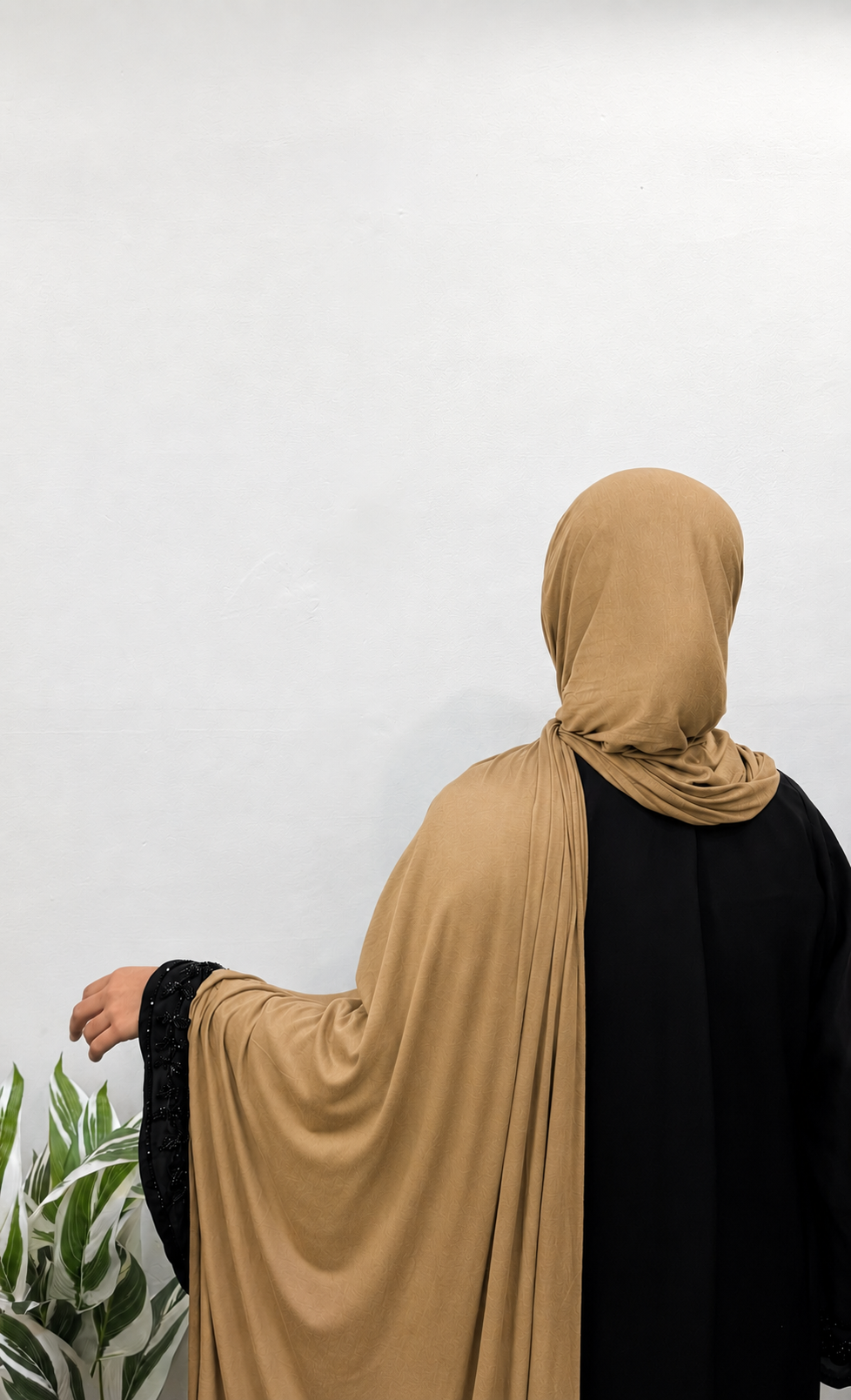 Woman wearing a Fallow Jersey Hijab with soft drape and full coverage