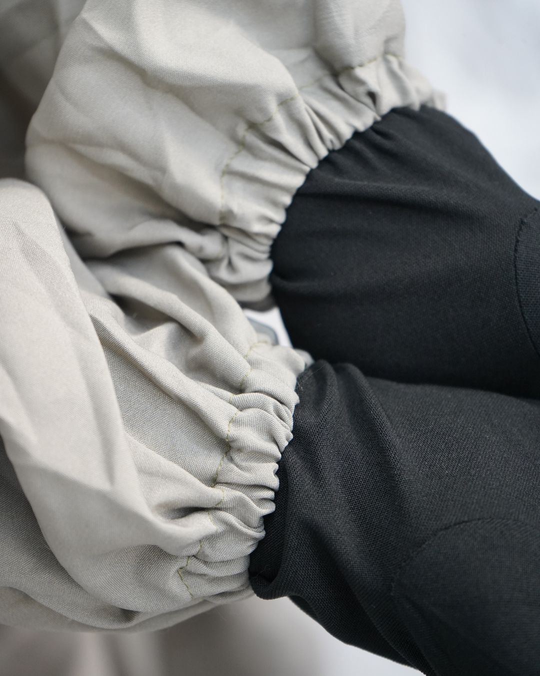 Comfortable gathered sleeve design on solid gray prayer outfit.