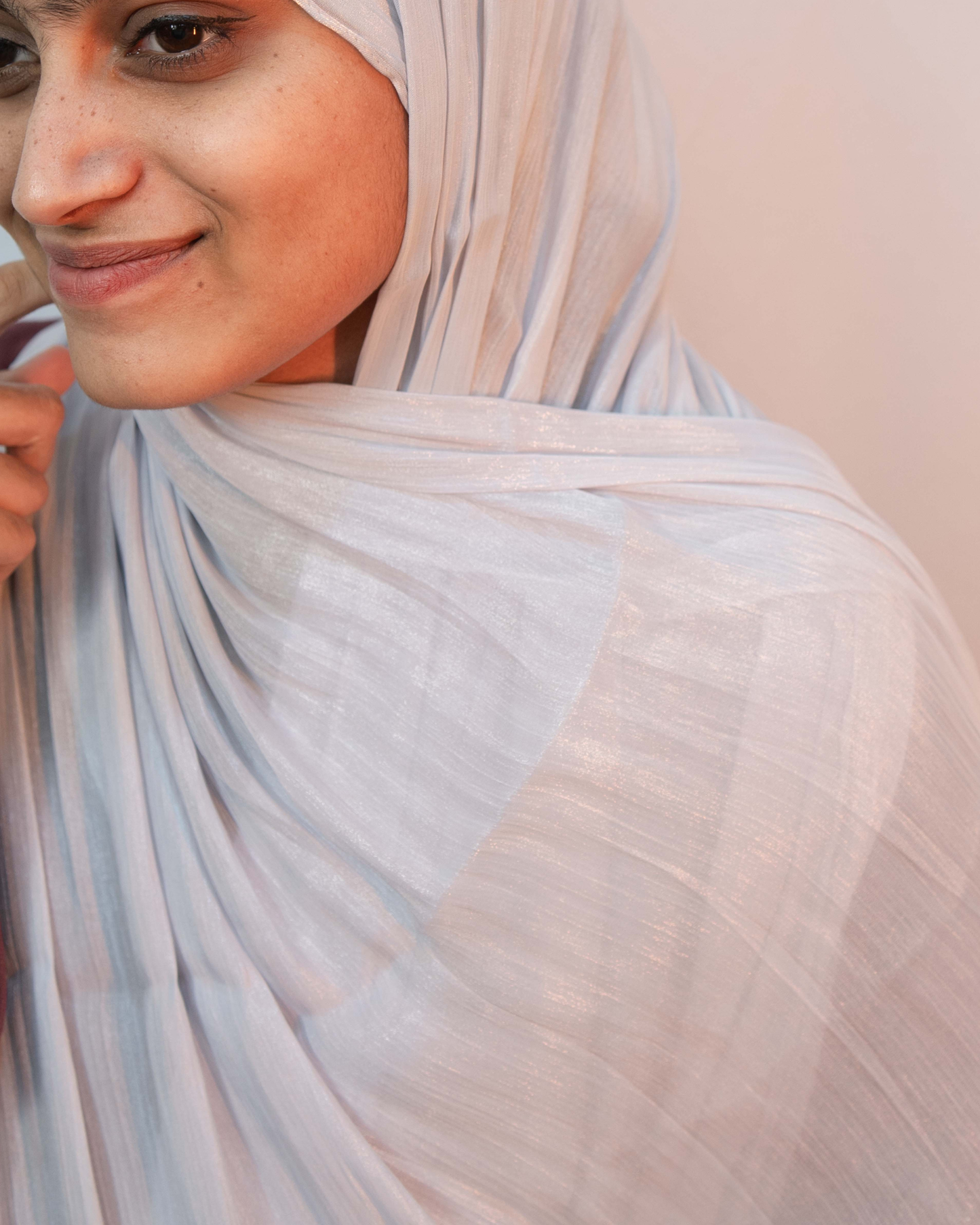 Close up of ice blue shimmer hijab showing soft texture and subtle glossy finish