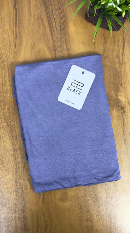 Neatly arranged lavender jersey hijab for an elegant touch.