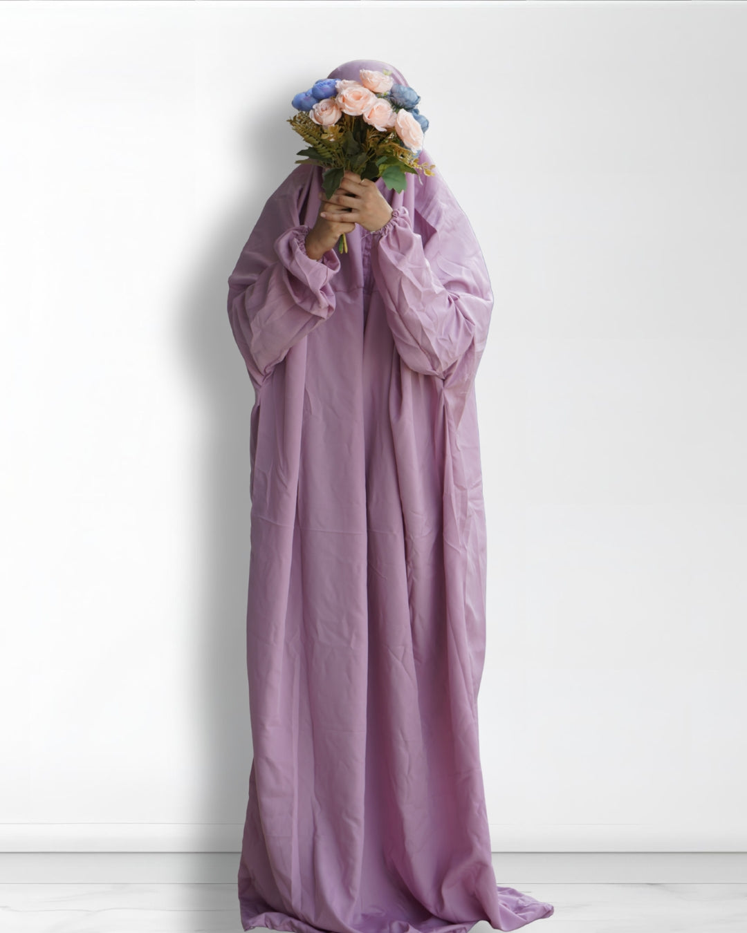 Light purple Islamic prayer dress full length front view with floral bouquet.
