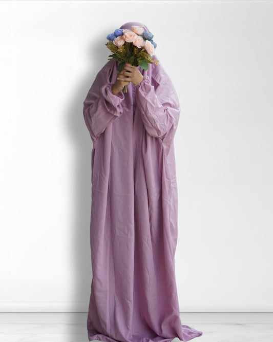 Light purple Islamic prayer dress full length front view with floral bouquet.