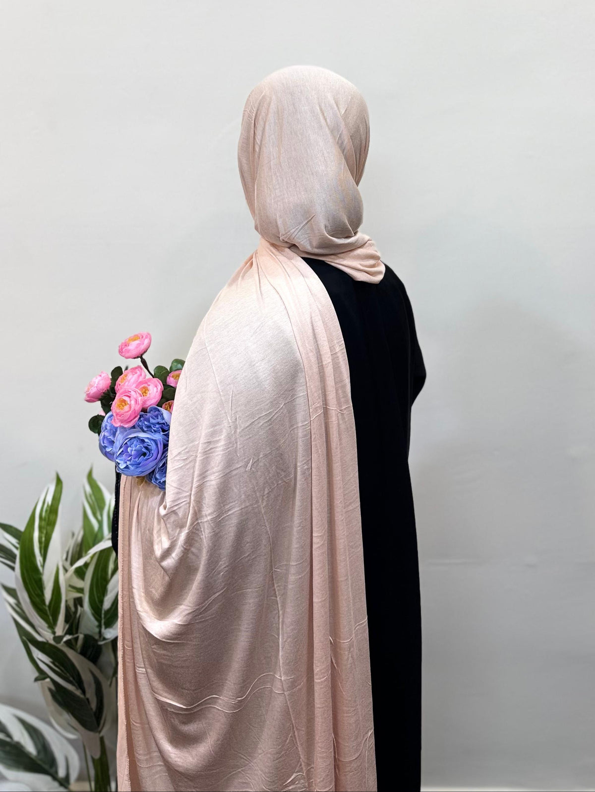 Millennial pink jersey hijab with clean, minimalist wrap.