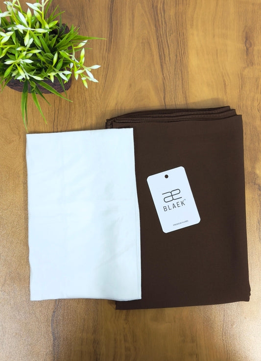 Warm mocha hijab with a crisp white cap for a striking contrast.