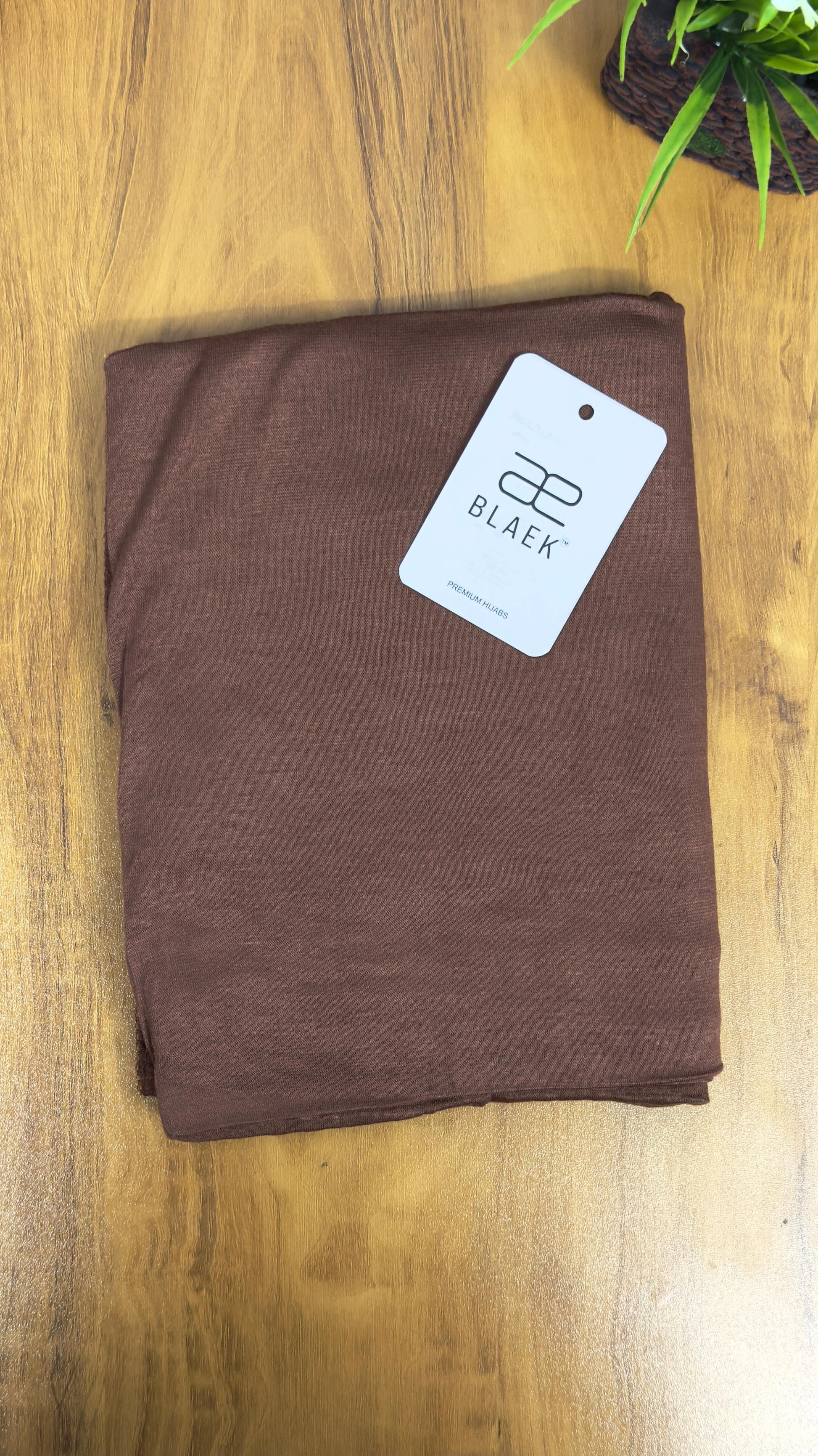 Comfortable mocha-toned jersey hijab for everyday wear.