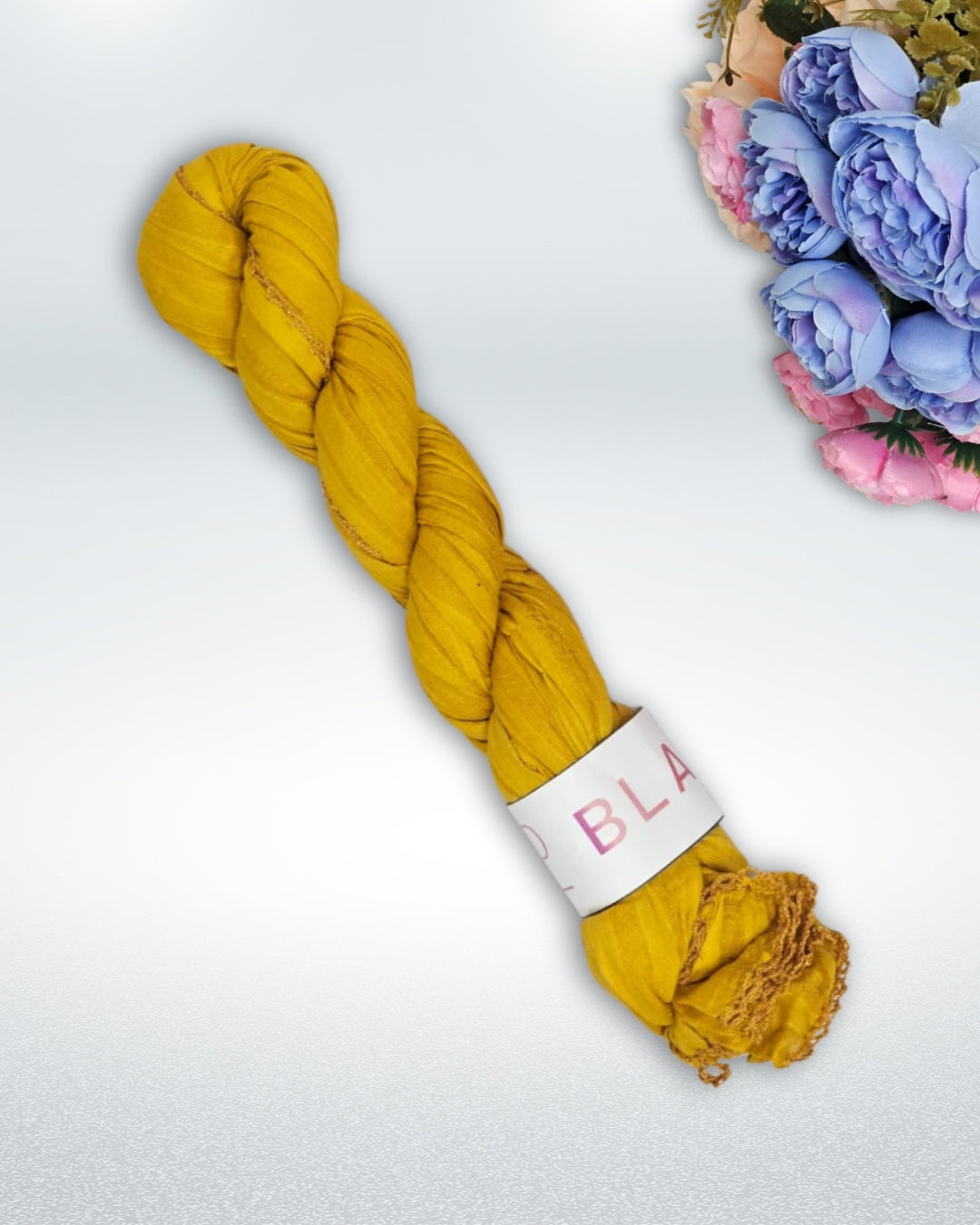 Mustard yellow cotton shawl with soft breathable fabric and knotted fringe edges – lightweight and stylish for everyday wear.