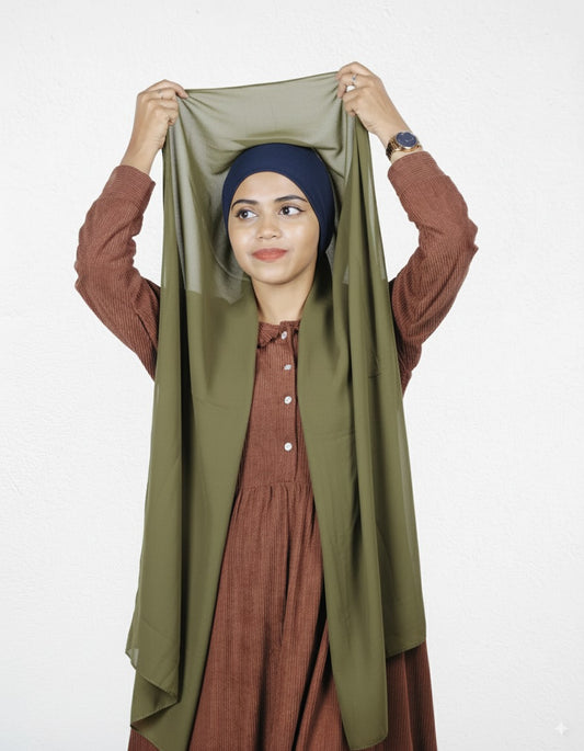 Slip-on olive green hijab with navy blue cap, premium chiffon fabric.