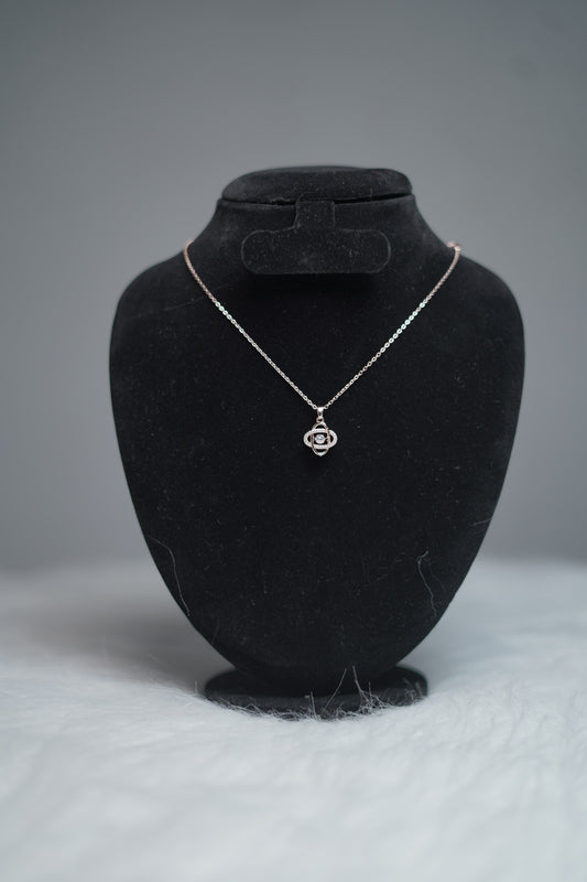 Orbit Luxe Necklace styled on black velvet necklace stand.