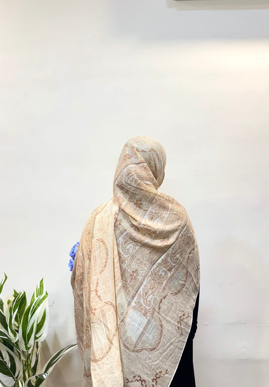 Soft pale yellow hijab, lightweight and breathable, offering comfort and a refined, versatile look.