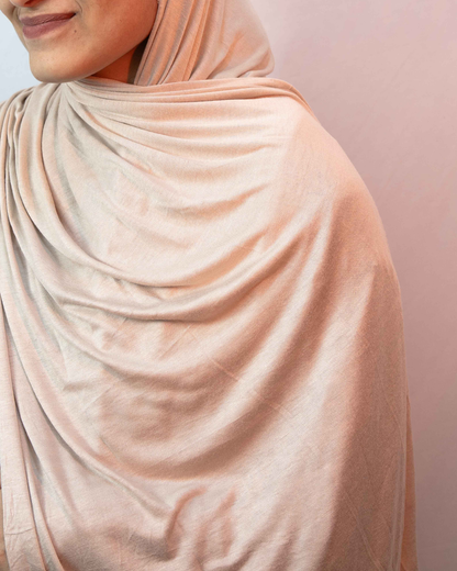 Peach nude jersey hijab fabric close up soft breathable stretch jersey material