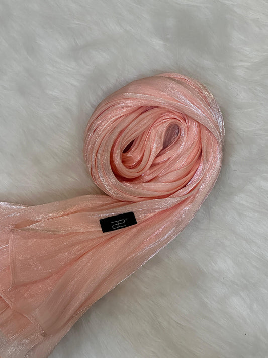 Rose Gold Shimmer Hijab in a round layout showing soft drape and shimmer.