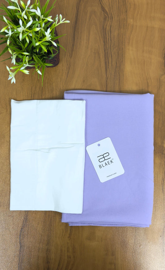 Gentle lavender hijab with a lightweight white cap for an effortless feel.