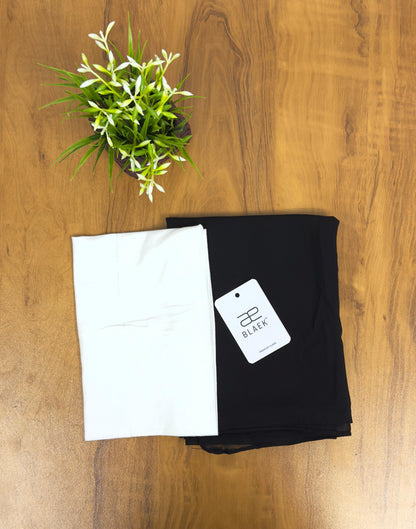 Minimalist black hijab with a lightweight white cap and strong magnets.